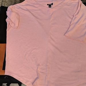 A n a pinkish blush short sleeve cold shoulder blo